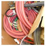 Gaylord pallet with lots of hose of various kind