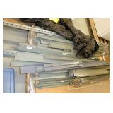 Pallet of shelving, boards are 2x4 ft, plus an acrylic bin