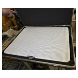 Pallet of tech items including 2 calibration boards and a Thorlabs stage