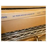 Group of wire shelving and 4 new boxes of posts and new box of two 48x18 shelves