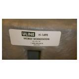 Like new Uline mobile workstation 45x24x35 and a pail of dessicant