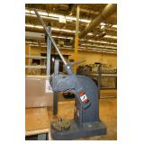DAKE Arbor press 1-1/2 Ton mounted on a 72x36 workbench with wood top and steel legs, adjustable height