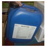 Three jugs of machine coolant NALCO 77336 Antifreeze for closed cooling and heating systems