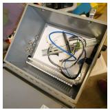 Electrical enclosure box and some voltage testers
