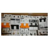 Thirteen 2-pole circuit breakers various Amps