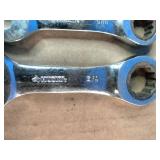 Snap On 3/8" Extension and Huskey SAE chrome-plated stubby ratcheting combination wrenches, often used for working in tight spaces.
