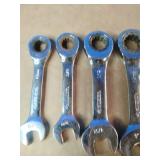 Snap On 3/8" Extension and Huskey SAE chrome-plated stubby ratcheting combination wrenches, often used for working in tight spaces.
