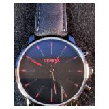 Brand New  Geneva brand minimalist quartz watch featuring a black dial with red hour markers.