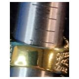 Brand New This is a men’s Pinky Ring yellow gold-plated ring featuring a large center stone surrounded by smaller simulated diamonds. Size 7