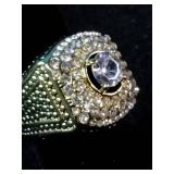 Brand New This is a men’s Pinky Ring yellow gold-plated ring featuring a large center stone surrounded by smaller simulated diamonds. Size 7