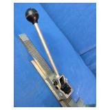 This is a Powernail PowerJack Model 100 flooring jack used to position and straighten hardwood floor boards.