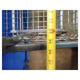 This is a R&B Wire Products commercial laundry cart with a clothes hanging rack.
