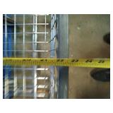 This is a R&B Wire Products commercial laundry cart with a clothes hanging rack.