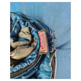 This is a Coleman blue quilted sleeping bag.