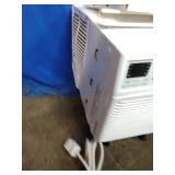 TCL window air conditioner, 12,000 BTU , featuring digital controls and adjustable vents. With Remote Control