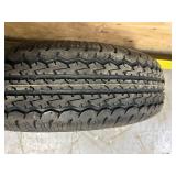 RADIAL TRAILER TIRE (cracked seal)