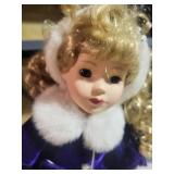 Collectible Blonde Doll in Formal Winter Outfit