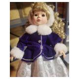 Collectible Blonde Doll in Formal Winter Outfit