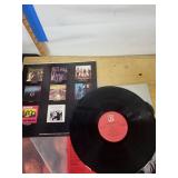 The Doors Greatest Hits, Janis Joplin Kozmic Blues, Lps and Janis Joplin Portrait Printed on a Dictionary Page (Lot of 3)
