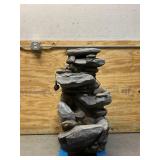 ^ Outdoor Cascading Water Fountain with Natural Looking Stone Waterfall