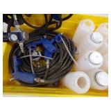 Spray Painting set up with hose and containers
