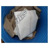 Metal Barrel with Canvas and Feed Sacks with Markings