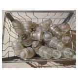 Metal Crate Full of Vintage Insulators