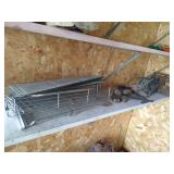 Shelf of Clamps, Grates, Etc