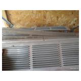Shelf of Clamps, Grates, Etc