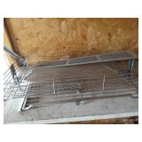 Shelf of Clamps, Grates, Etc