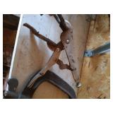 Shelf of Clamps, Grates, Etc