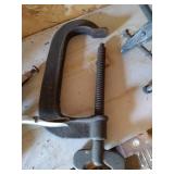 Shelf of Clamps, Grates, Etc