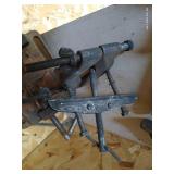 Shelf of Clamps, Grates, Etc