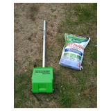 Bag of Grass Seed & Green Machine Attachment
