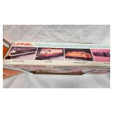 Lionel Northern Pacific Box Car and Sante Fe Hopper