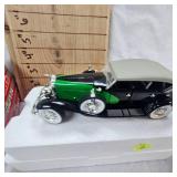 1:24 Mercedes Roadster, 1934 Duesenberg Model