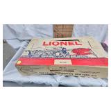 Box with Lionel Train Cars and Accessories as Shown