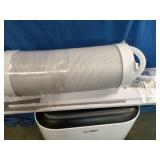 Airo Comfort portable air conditioner featuring a white finish and an included window vent kit