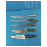 This is a vintage lot of assorted stainless steel kitchen knives