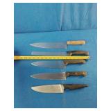 This is a vintage lot of assorted stainless steel kitchen knives