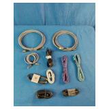 Ten assorted electronic data and charging cables organized against a solid blue background.