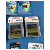 Consumer batteries and replacement halogen bulbs.