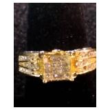 Yellow gold colored multi-row cluster ring featuring a distinctive square or grid-patterned center head. Size 7.25