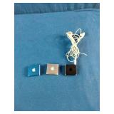 (3) Apple iPod Shuffle 4th Generation devices, known for their ultra-compact design and built-in clip.