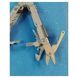 Gerber Multi-Plier 600 series tool, identified by its bead-blast stainless steel construction and sliding plier mechanism.