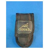Gerber Multi-Plier 600 series tool, identified by its bead-blast stainless steel construction and sliding plier mechanism.