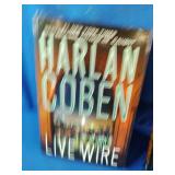 Inca Gold by Clive Cussler and Live Wire by Harlan Coben, both popular suspense thrillers.