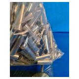 518 pieces of mixed, nickel-plated .357 Magnum shell casings intended for ammunition reloading.
