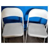 Metal folding chairs featuring a tubular metal frame