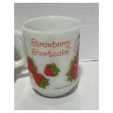 Two 1980  Vintage Anchor Hocking Strawberry Shortcake Coffee Mugs